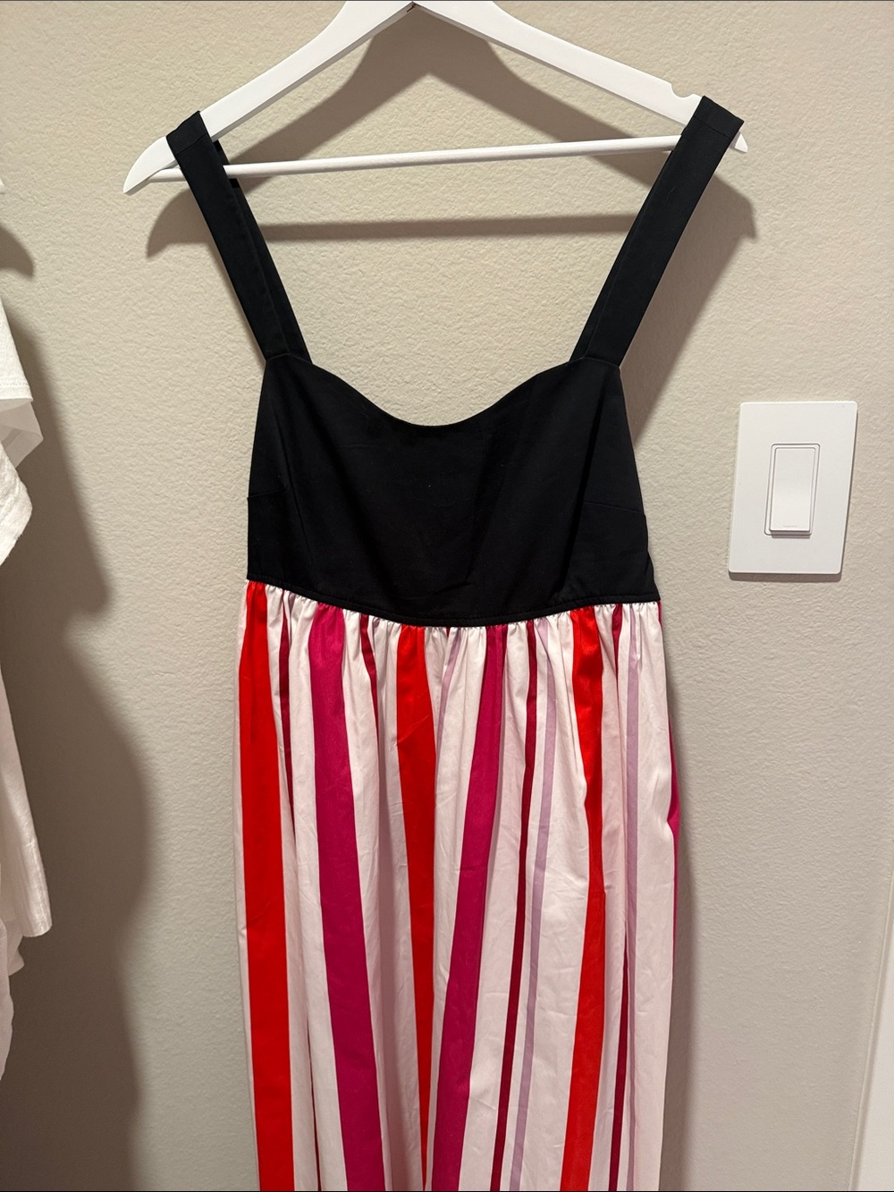 Be dazzling in this Kate Spade midi from the Gardenside collection.